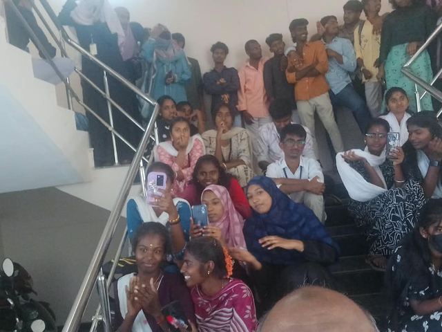 Students gathered on the campus stairway
